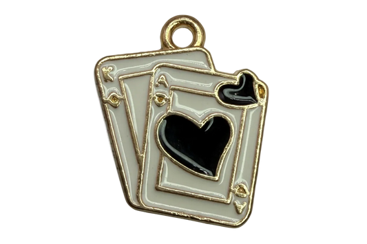 Gold-outlined white enamel playing cards with a black heart suit symbol