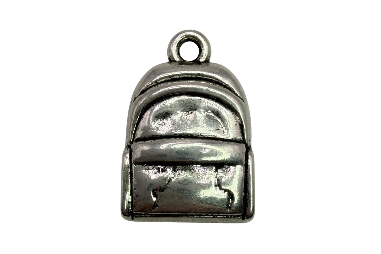 Silver mini backpack pendant with raised pocket and panel details on black background