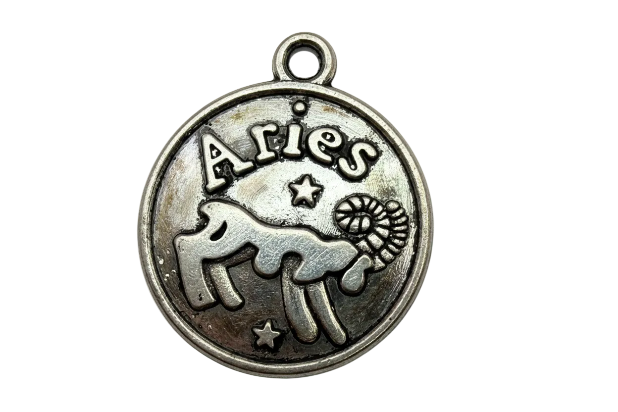 Antique silver round Aries zodiac medallion with ram silhouette and star accents
