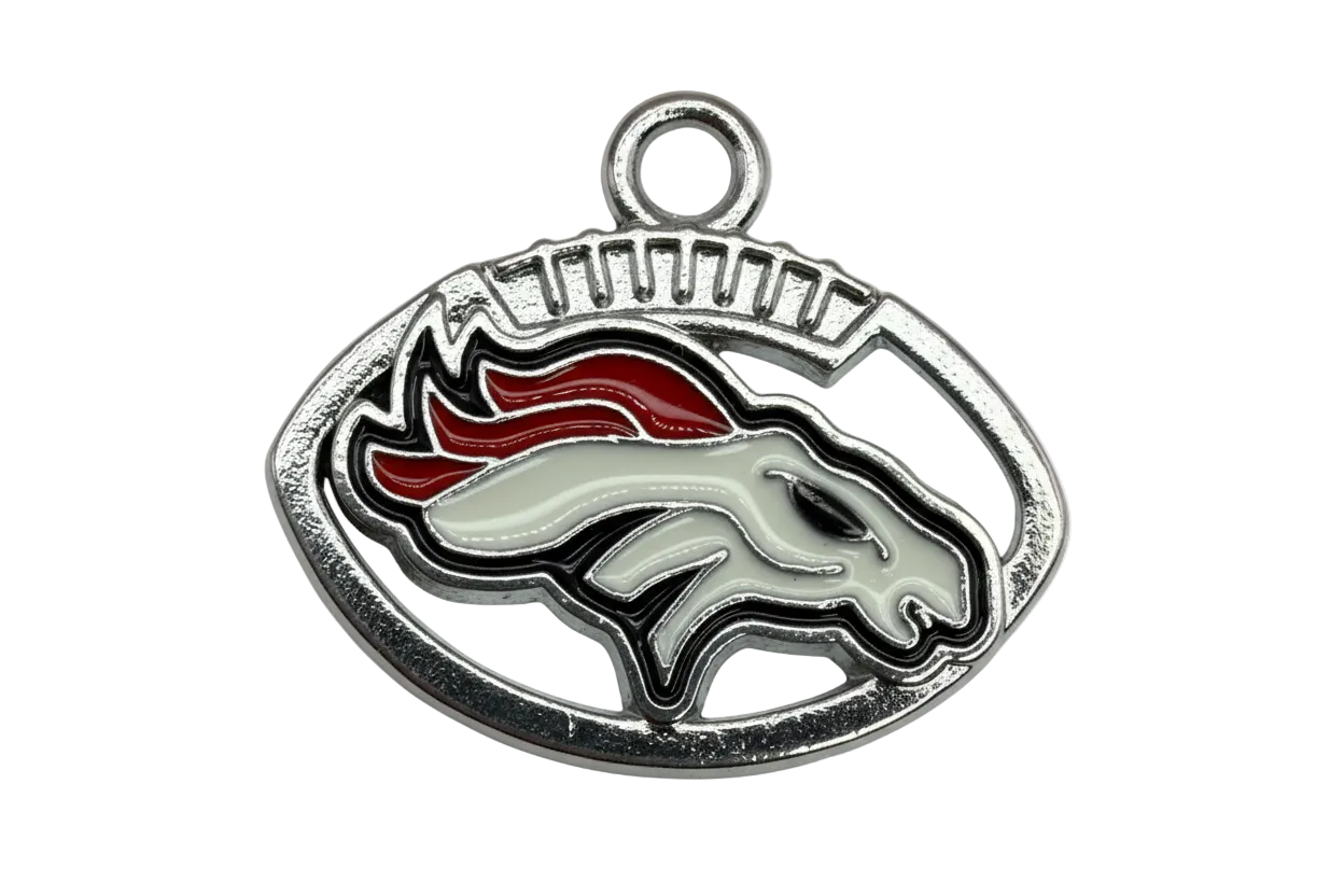 Oval silver enamel horse head football emblem with white horse and red-orange mane on black