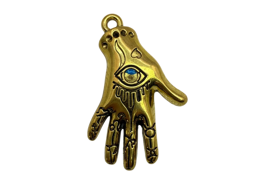Gold hand with engraved all-seeing eye and antiqued detailing on black background