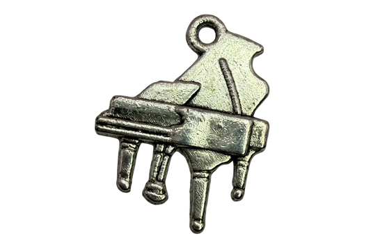 Antique silver grand piano pendant with raised details