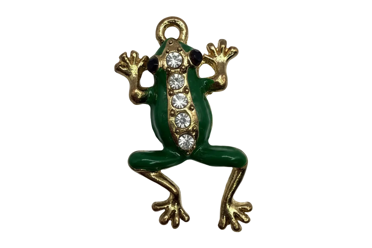Green enamel frog charm with gold details and a row of clear crystals