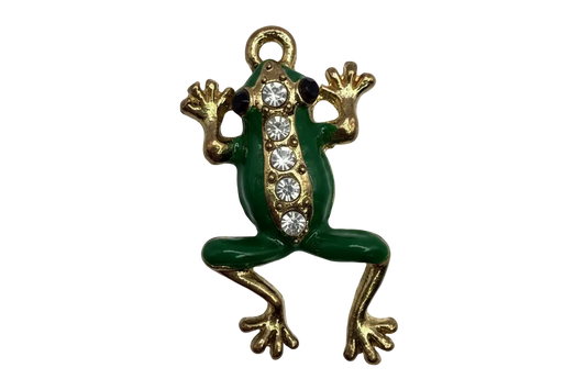 Green enamel frog charm with gold details and a row of clear crystals