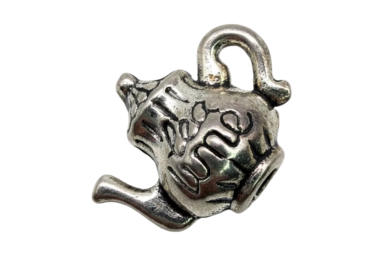 Polished silver-tone teapot charm with engraved details and raised lettering