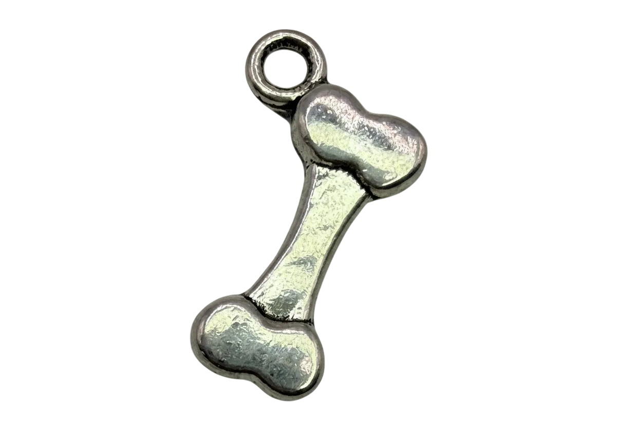 Polished silver dog bone pendant with smooth rounded ends on a black background