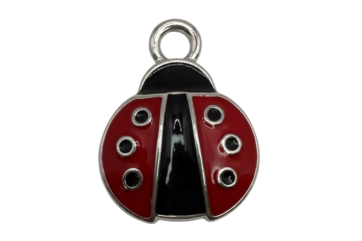 Red and black enamel ladybug charm with silver outline and spot details