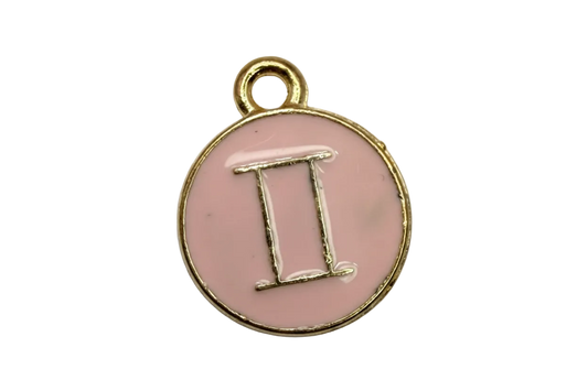 Round gold-tone disc with blush pink enamel and serif letter I detail