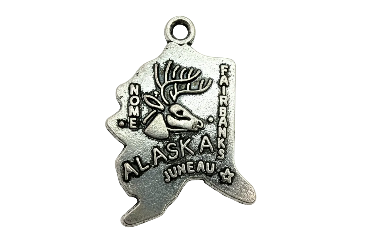 Antiqued silver-tone Alaska state map charm with raised moose and city names