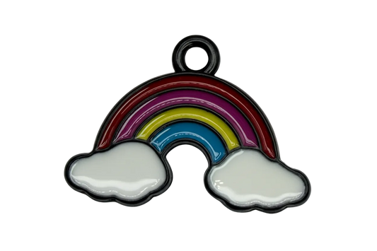 Glossy enamel rainbow with white clouds and dark outline, red purple yellow and blue bands