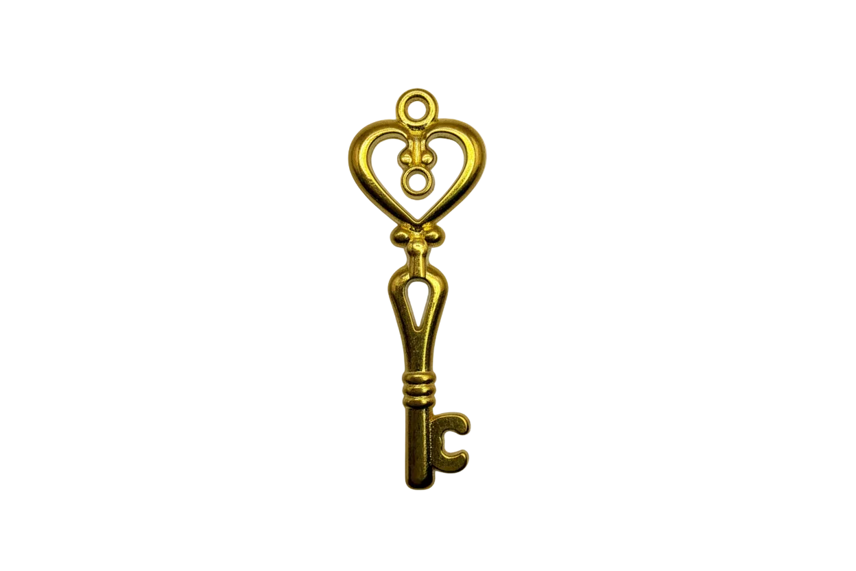 Ornate gold heart-top key charm