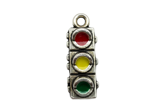 Mini traffic light charm in oxidized silver-tone metal with red, yellow, and green enamel lenses