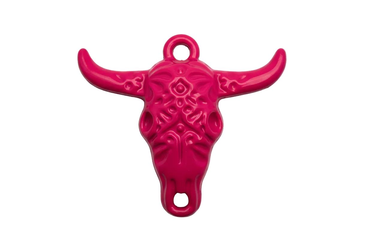 Glossy hot pink longhorn skull pendant with embossed detailing and silver metal accents