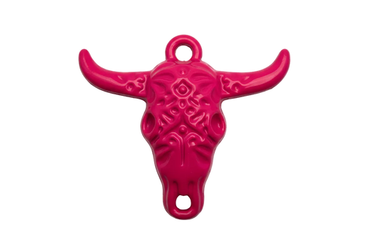 Glossy hot pink longhorn skull pendant with embossed detailing and silver metal accents