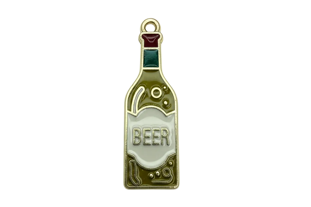 Gold beer bottle charm with amber enamel, white label, and raised beer lettering