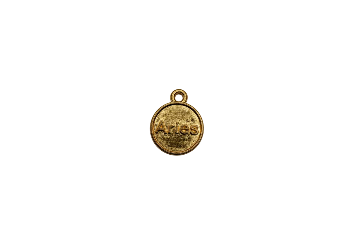 Gold Aries zodiac coin with raised lettering