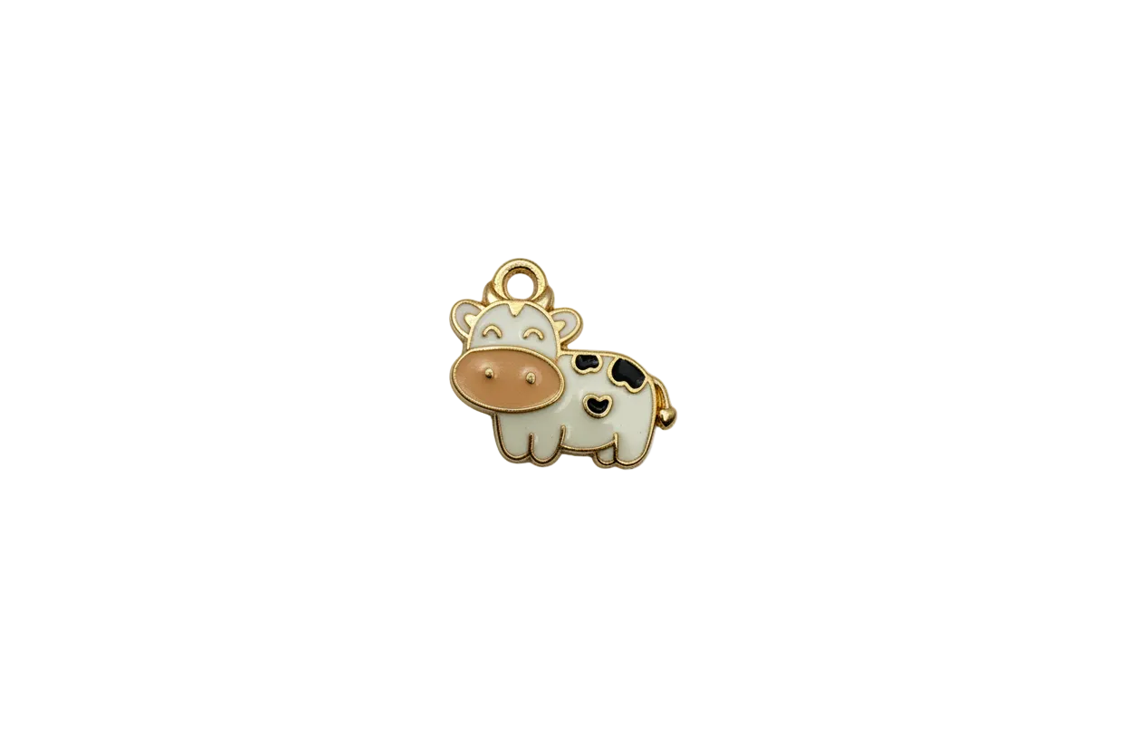 Enamel cow in white with black spots and blush snout, gold outline