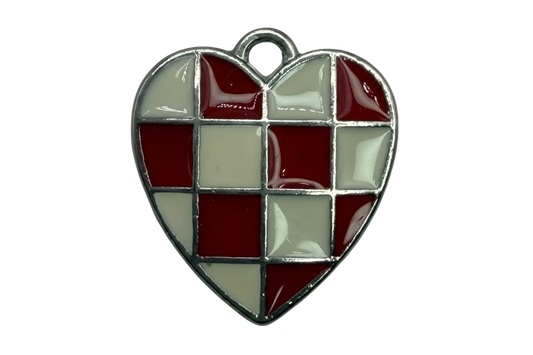 Red and cream checkerboard enamel heart with polished silver outline