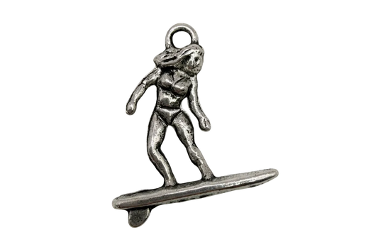 Oxidized silver surfer figure standing on a surfboard pendant