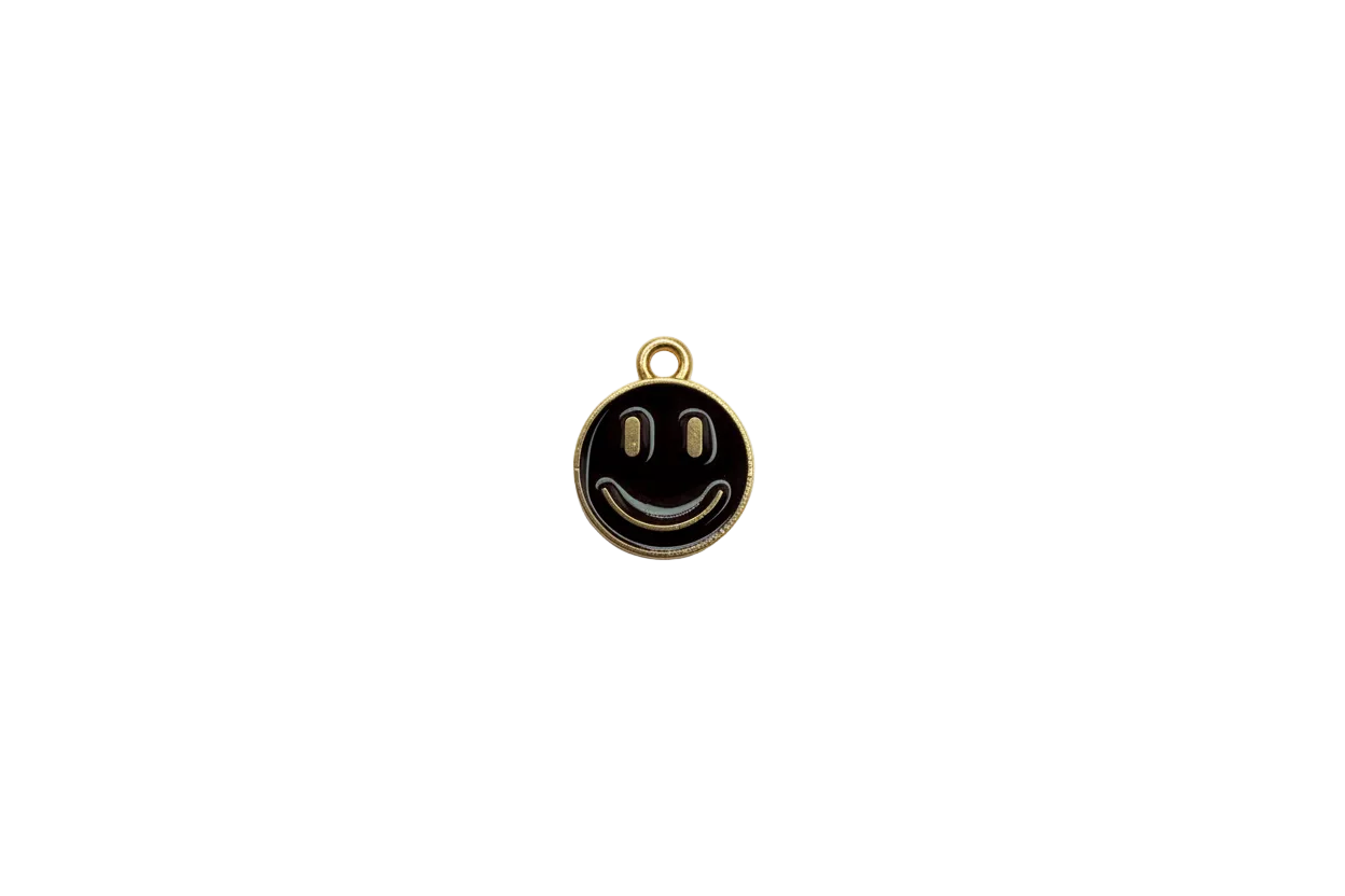 Black enamel smiley face disc in gold with pale blue accents