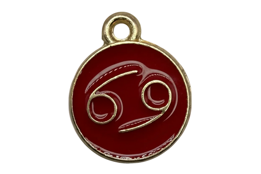 Deep red enamel round coin with Cancer zodiac symbol in gold outline