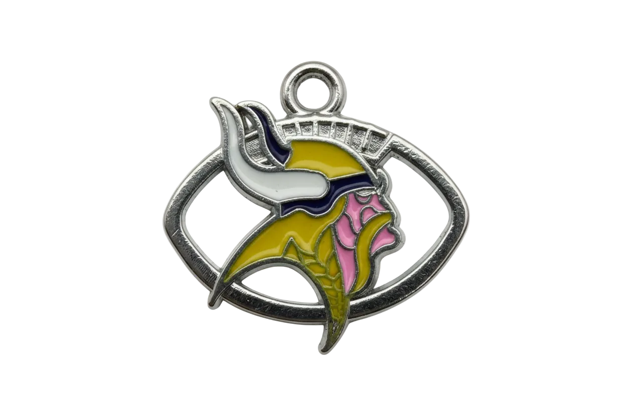 Silver-tone horned helmet emblem with yellow, white, navy, and pink enamel in an open oval frame