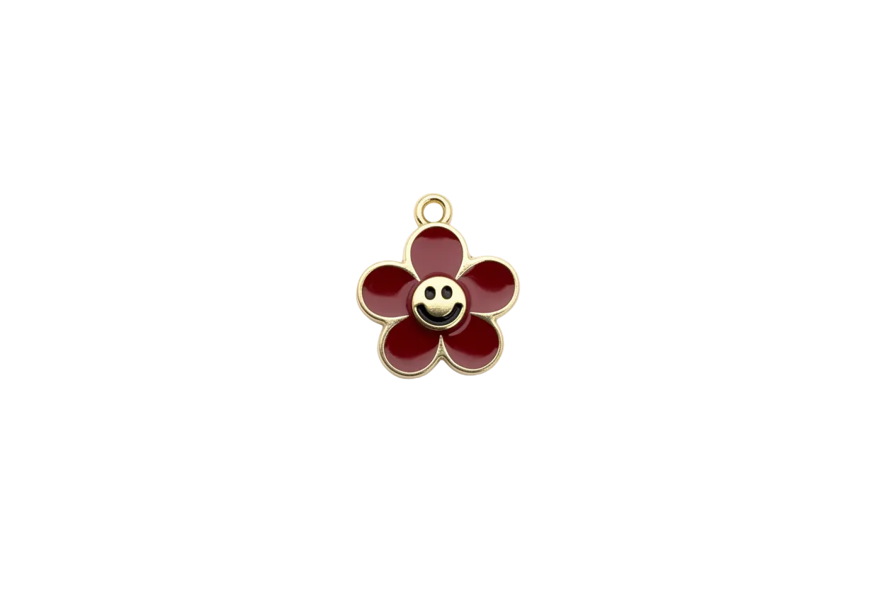 Red enamel smiley flower in gold with clear gem accent