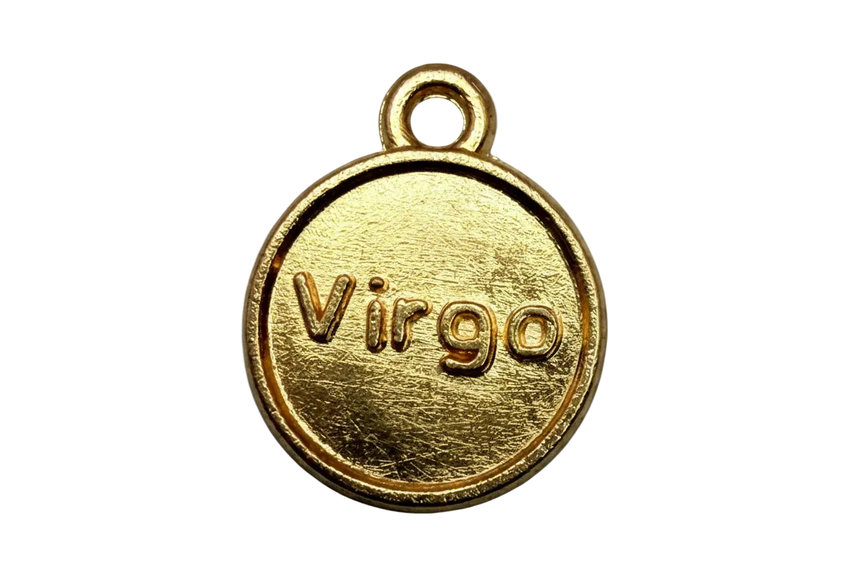 Round gold disc charm with raised Virgo lettering and brushed finish