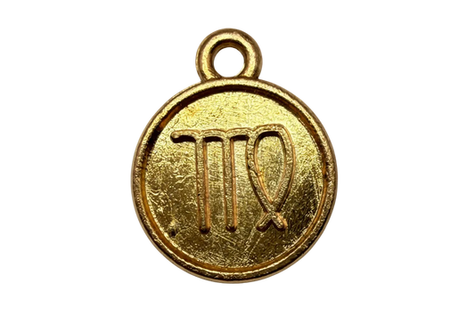 Round gold Virgo zodiac coin with raised symbol and textured finish