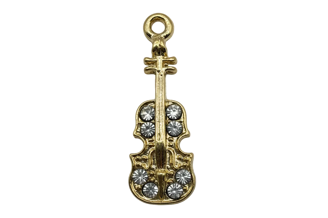 Gold violin charm with clear crystal accents on black background
