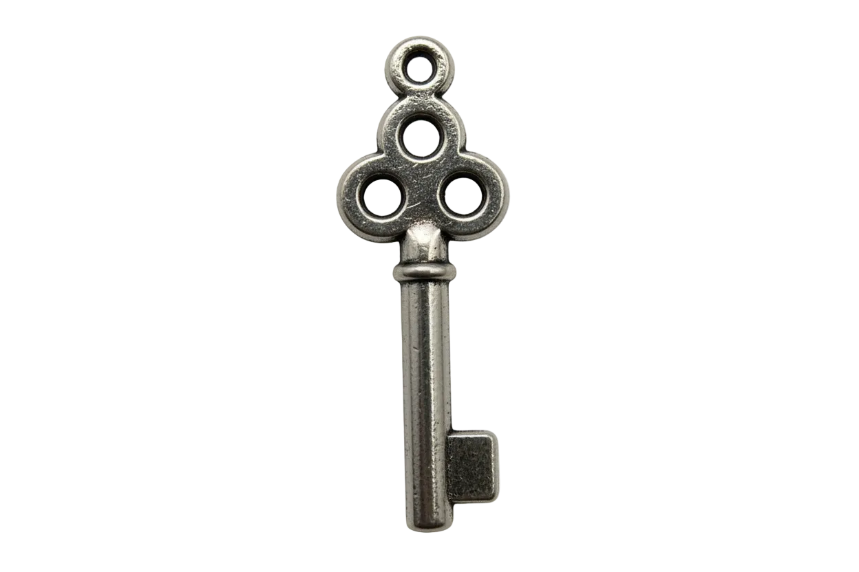 Antique-style silver key pendant with ornate clover-like bow on black background