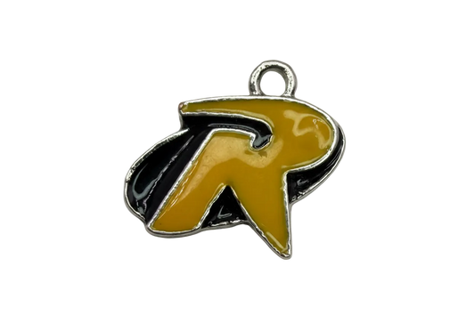 Mustard-yellow enamel letter R charm with black shadow and silver outline