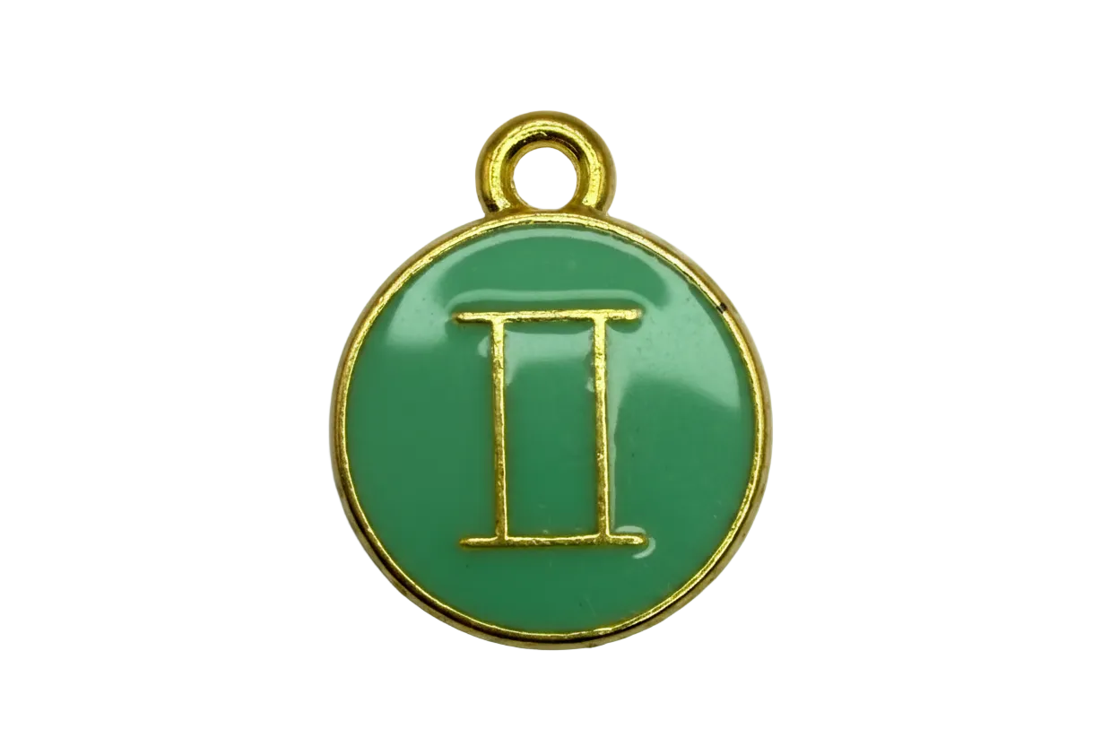 Green enamel round disc with gold outline and Gemini symbol