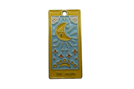 Gold rectangular tarot-style moon plaque with light blue enamel, red stars, and crescent moon detail