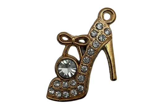 Gold high-heel shoe charm with bow and clear rhinestones, featuring a large faceted clear gem
