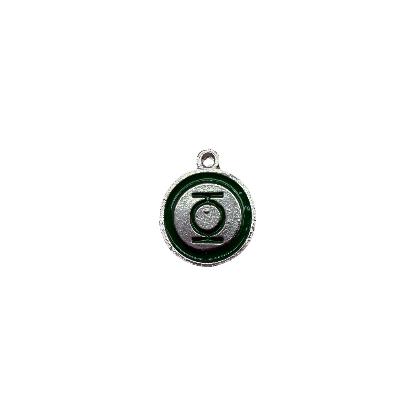 Silver emblem disc with deep green enamel ring