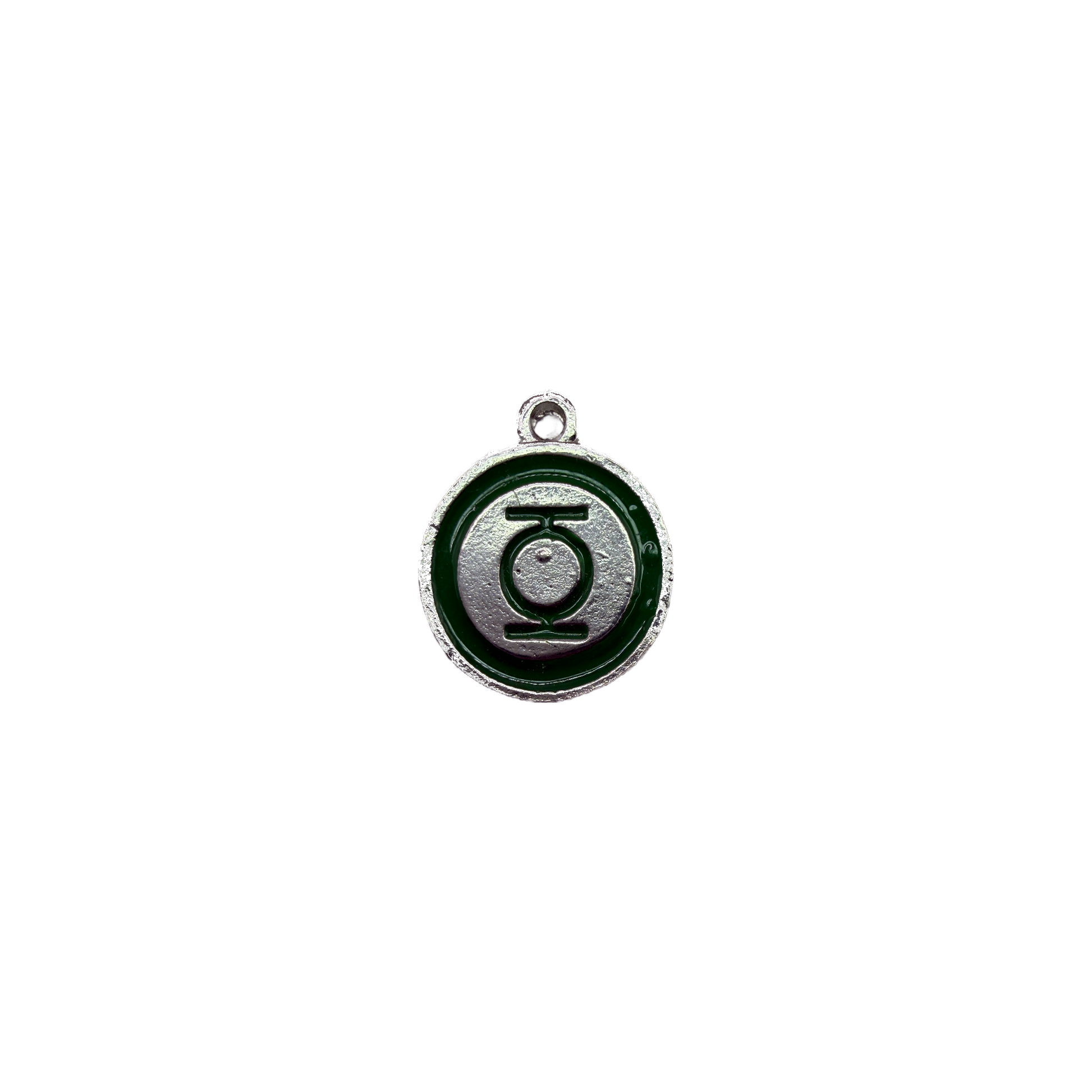 Silver emblem disc with deep green enamel ring