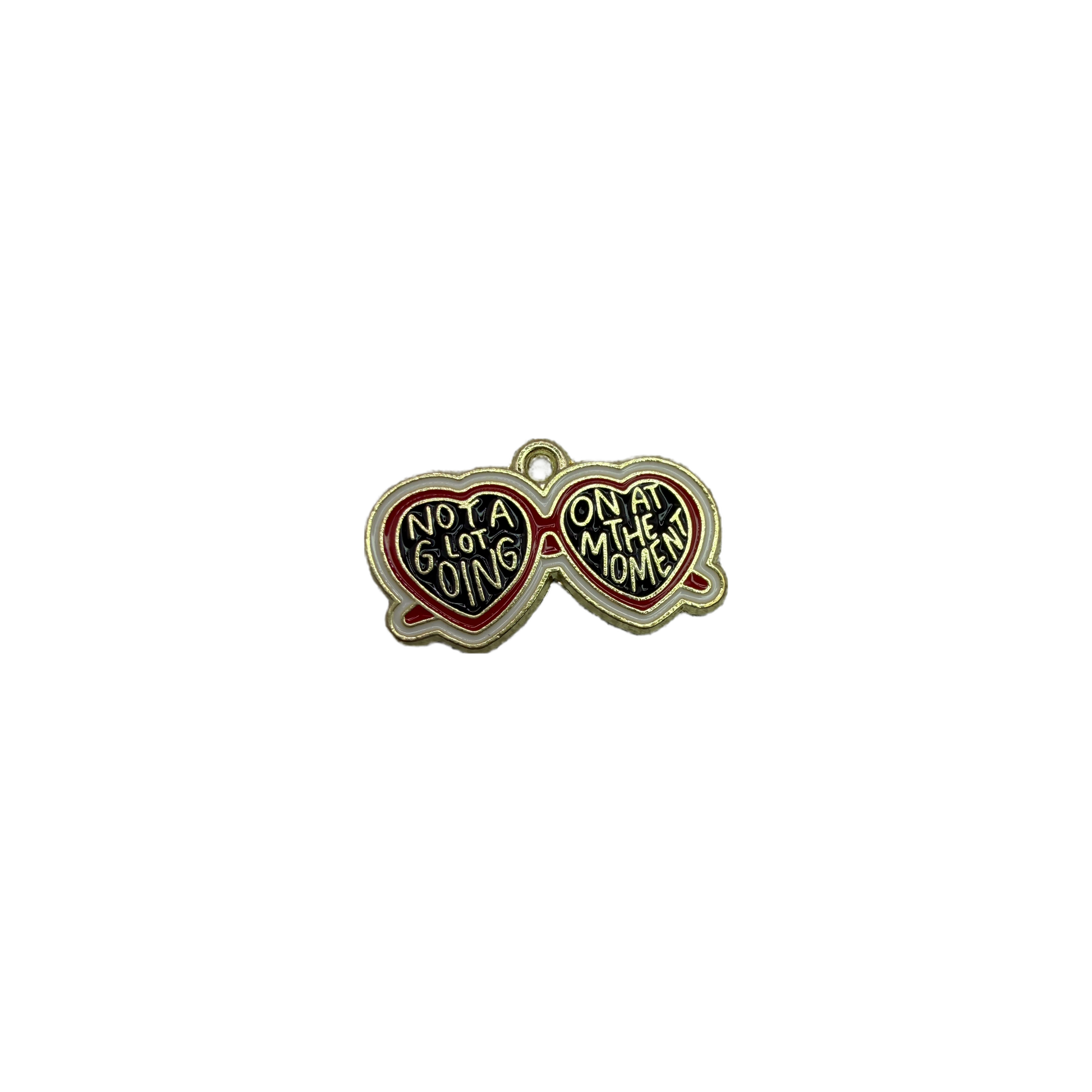 Heart sunglasses charm in black, red, and white enamel with raised quote text