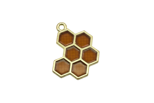 Amber honeycomb cluster with translucent hexagon panels in gold finish