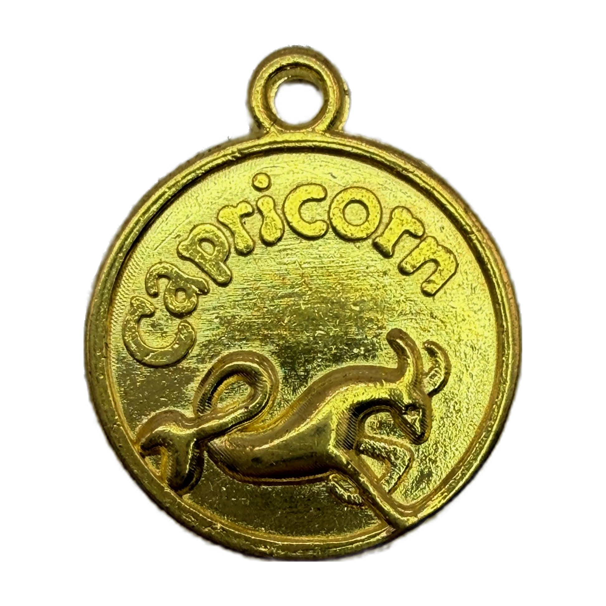 Gold round Capricorn zodiac coin with raised goat motif and embossed lettering