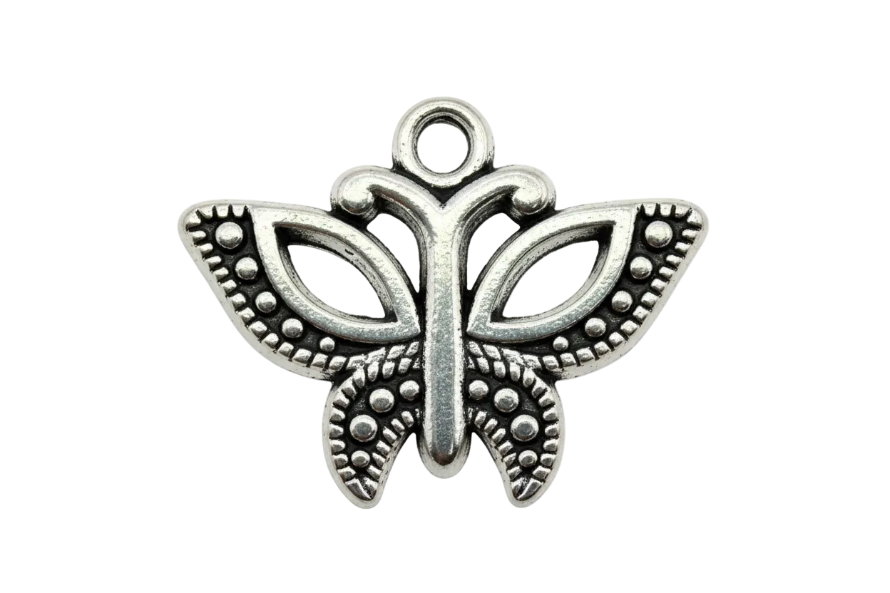 Antiqued silver ornate butterfly with openwork wings and beaded detailing