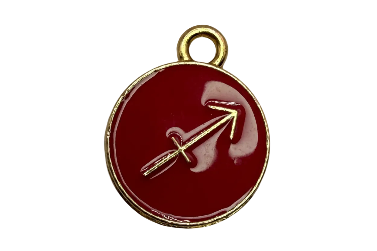 Round deep-red enamel medallion with gold Sagittarius arrow symbol