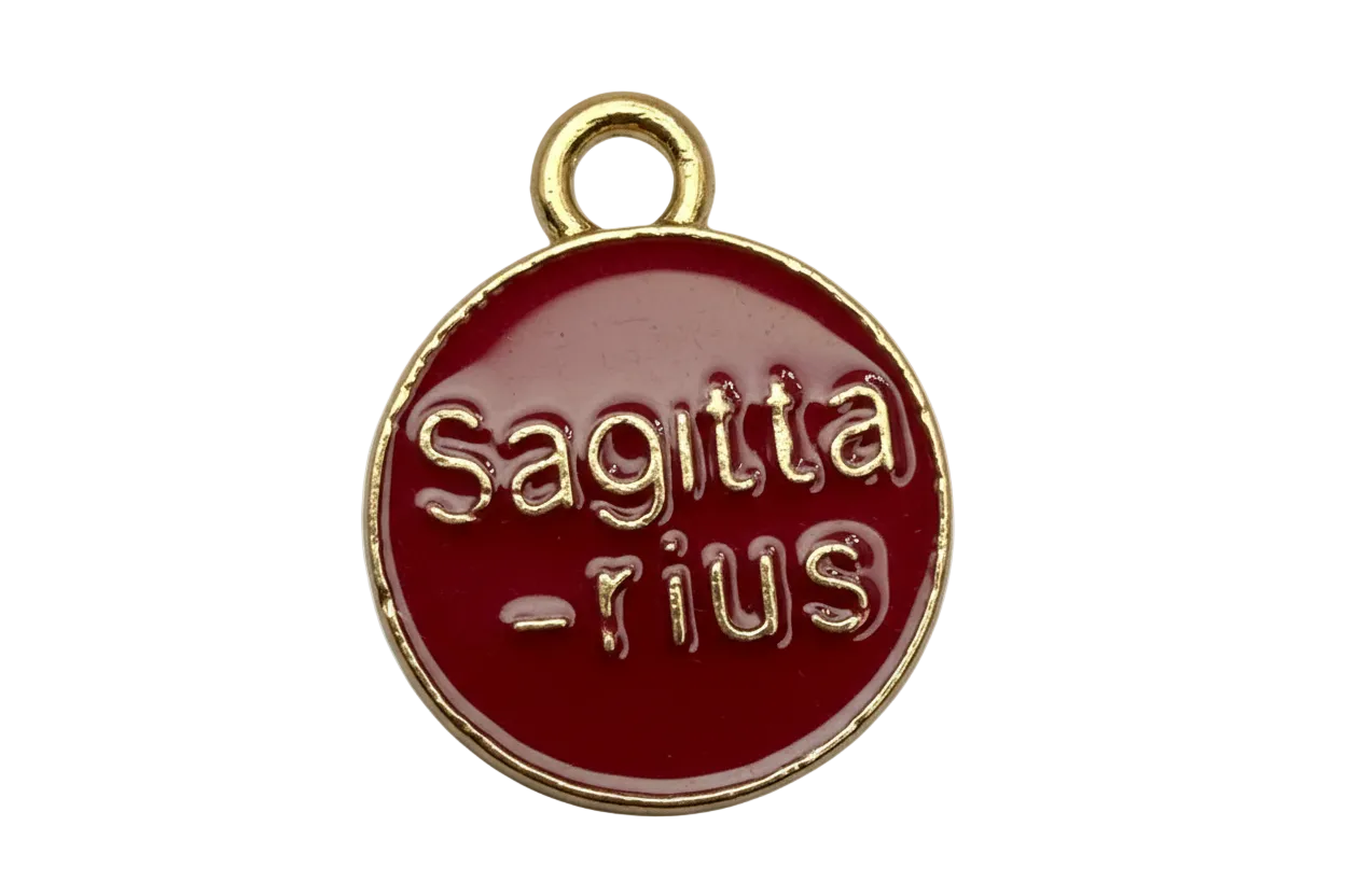 Round red enamel Sagittarius zodiac disc with raised gold lettering and gold border