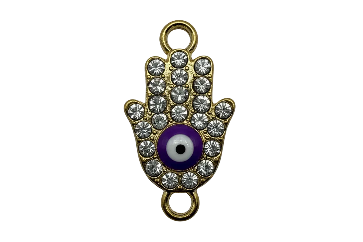 Gold hamsa hand charm with clear crystal accents and a blue evil eye center