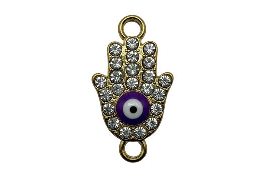 Gold hamsa hand charm with clear crystal accents and a blue evil eye center