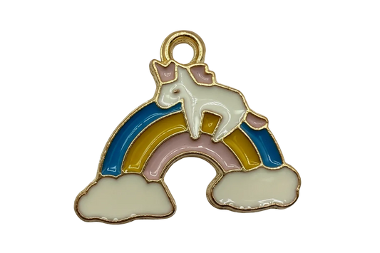 Gold-tone enamel unicorn resting on a pastel rainbow with white clouds