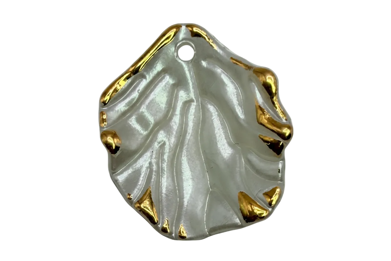 Pearlescent ivory leaf with sculpted veins and polished gold edge accents