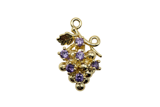 Polished gold grape cluster with faceted violet gems and small leaf detail