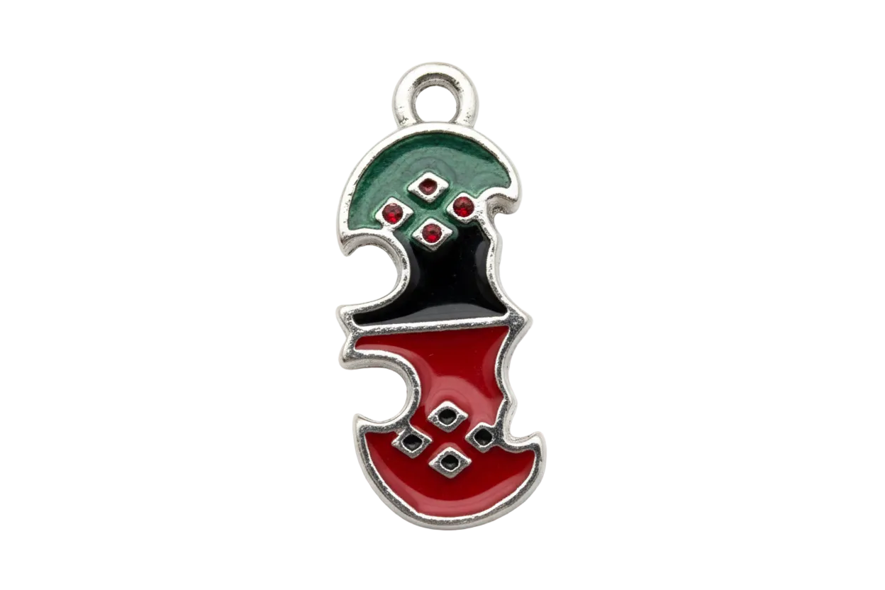 Two-tone puzzle piece charm in glossy red and black enamel with silver outline and geometric accents