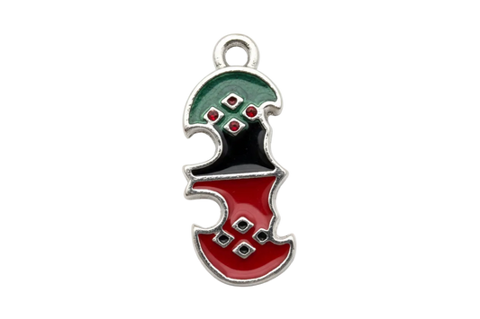 Two-tone puzzle piece charm in glossy red and black enamel with silver outline and geometric accents